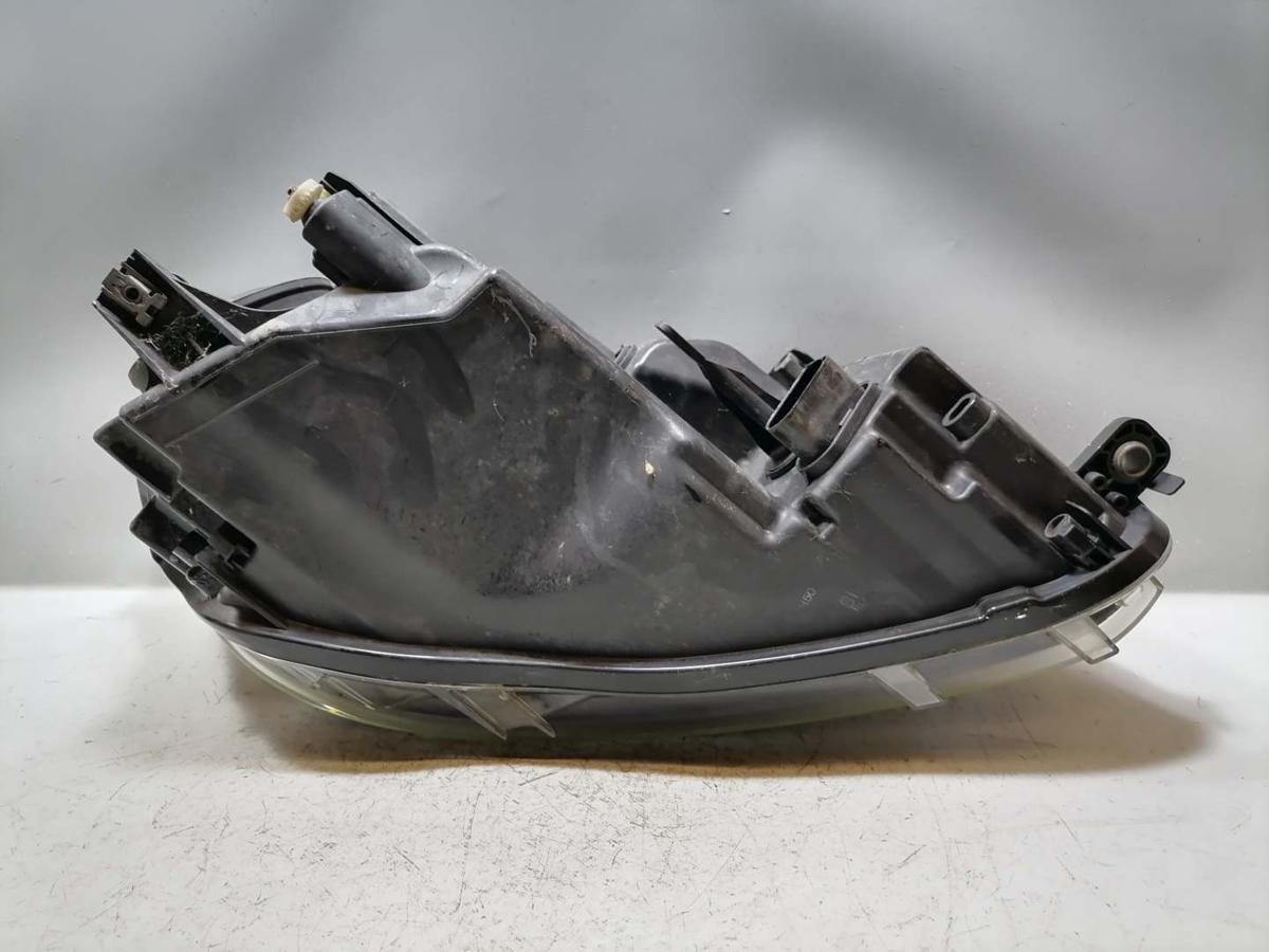 VW Caddy 3 2K original Scheinwerfer vorn links Halogen Facelift Bj.2011